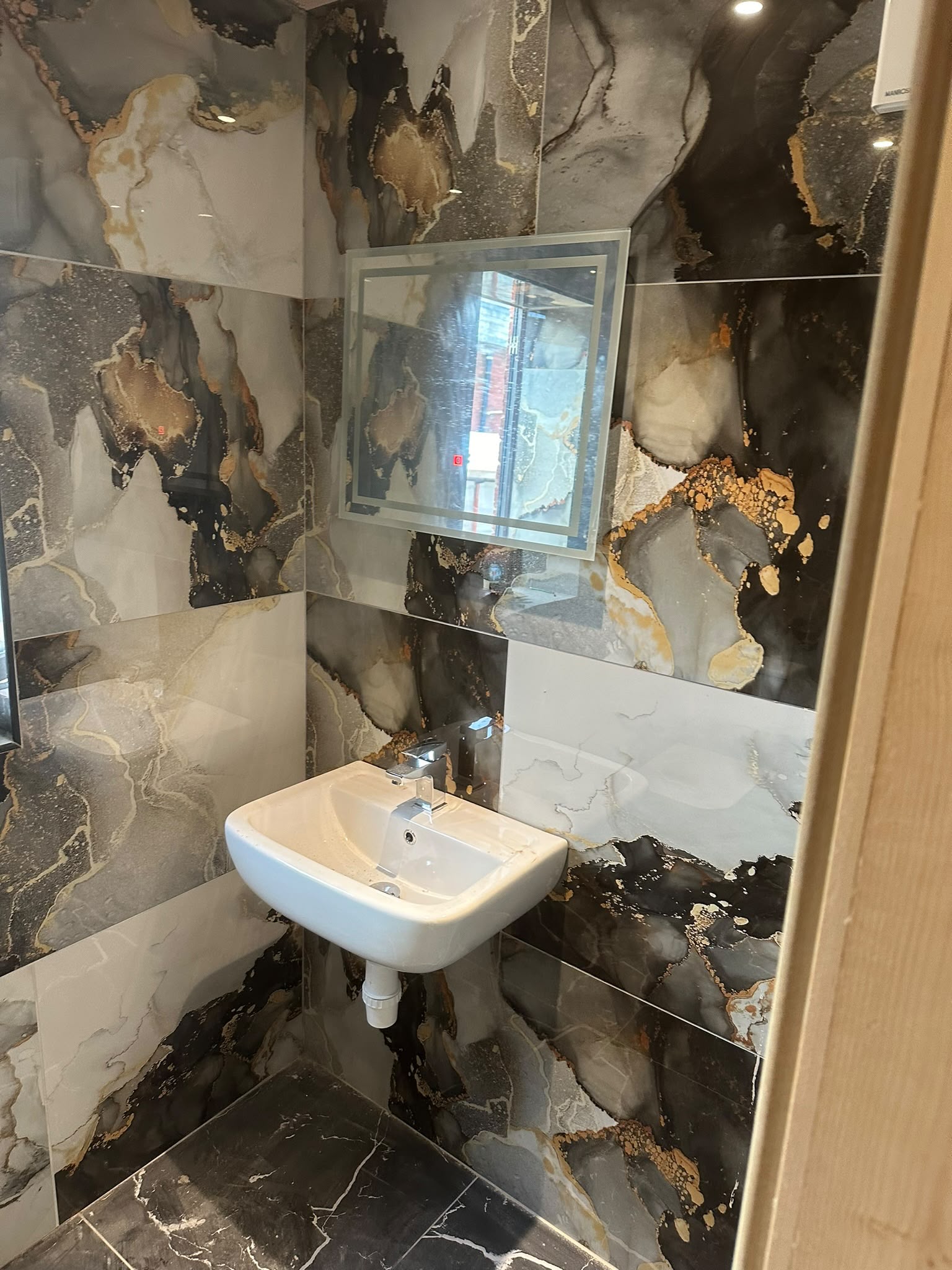 Bathroom basin and feature tiling