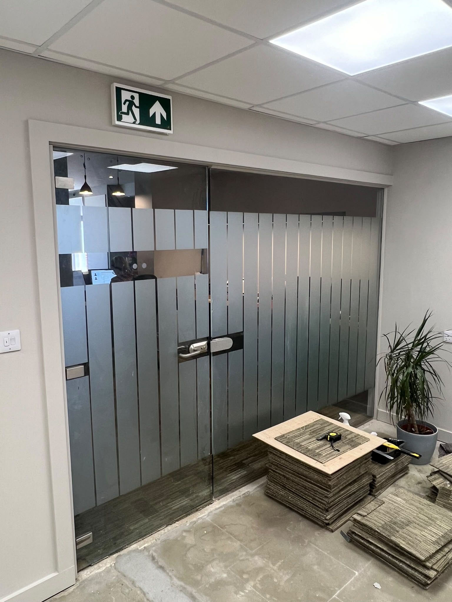 Commercial glass partition installation